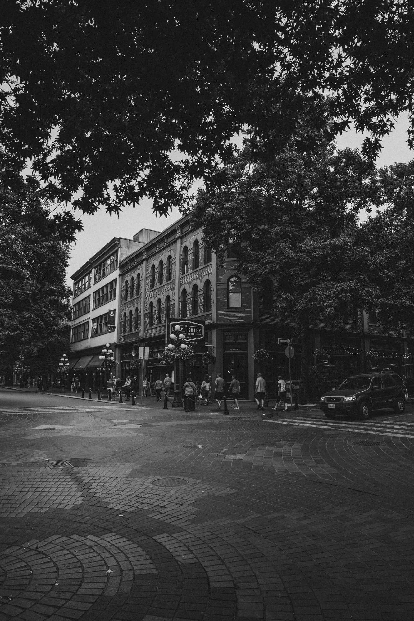 Gastown — cobblestone streets, steam clock, brick heritage facades