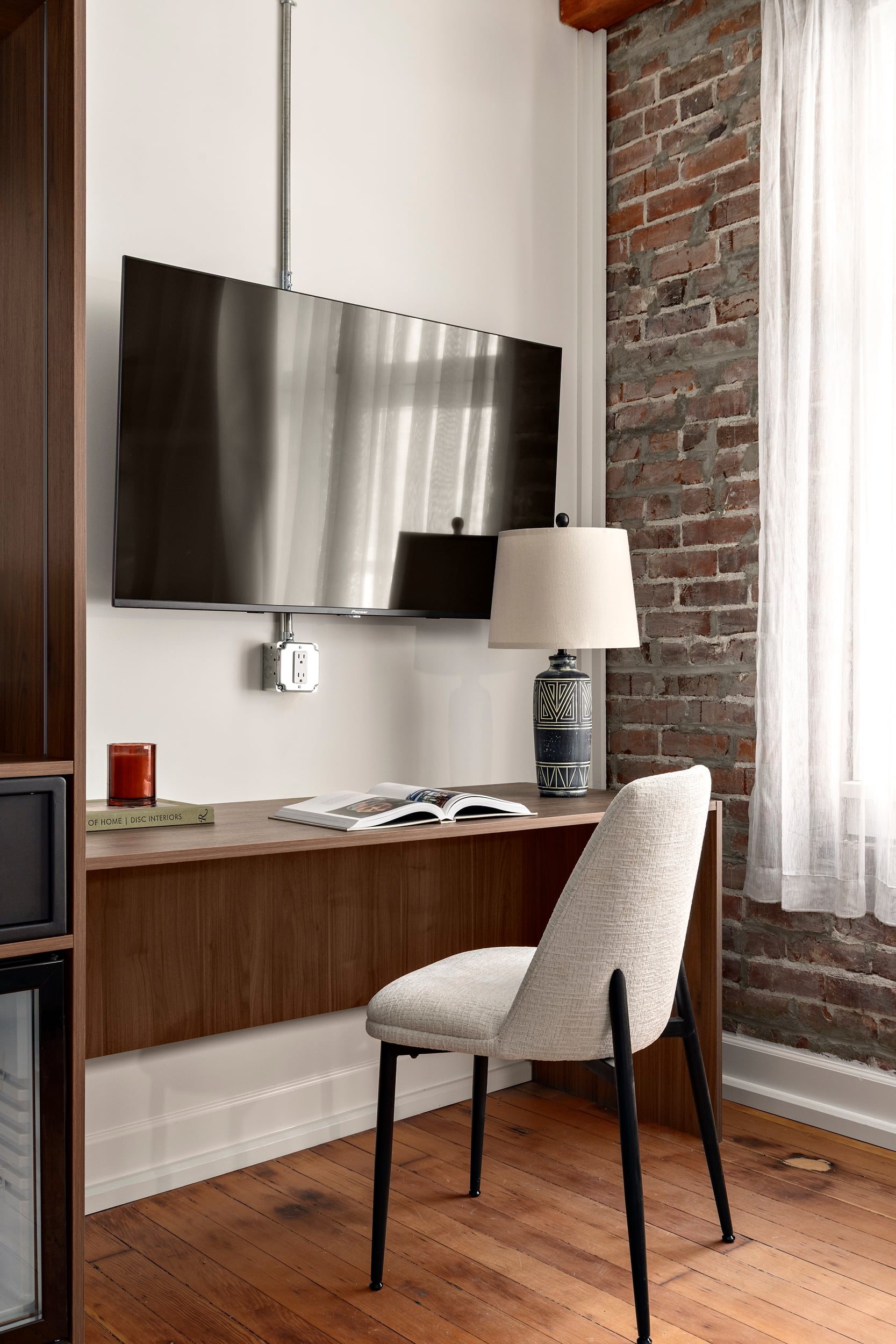 Studio room at Hotel Modo with a made bed and extra space to unwind